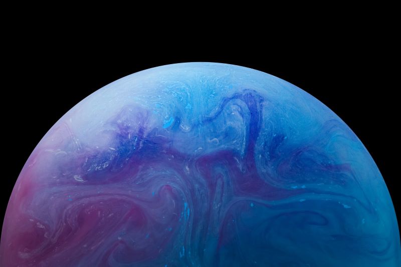 Top 10 stories of 2024: Bluish purple planet with some swirls.