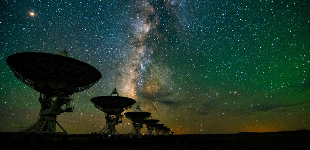 Antennas of the Very Large Array against the Milky Way. Even with all we've learned, we're still left wondering about many things. Credit: NRAO/AUI/NSF/Jeff Hellerman