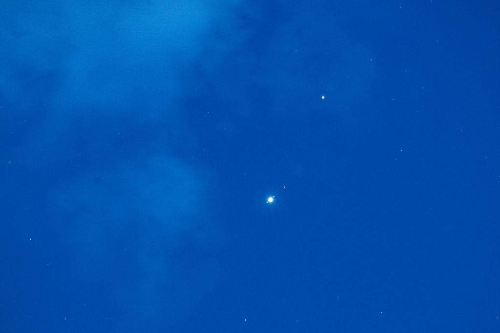 Planets Mars and Jupiter are seen in conjunction in the sky above L'Aquila, Italy, on August 13th, 2024. Jupiter satellites, well known as "Jupiter Moons", are visible Upcoming to the World. Mars and Jupiter will meet on the night between August 13 and 14 in the constellation of Taurus. The Gas Giant and the Red World will Form a spectacular close conjunction that weather permitting will be perfectly visible to the naked eye.