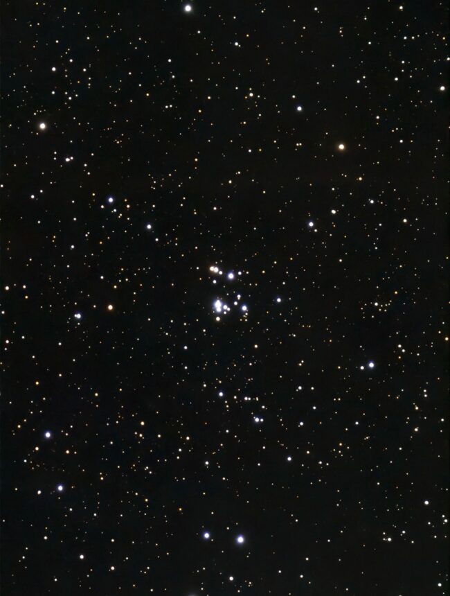 A sparse grouping of stars roughly resembling the number 37, among scattered stars.