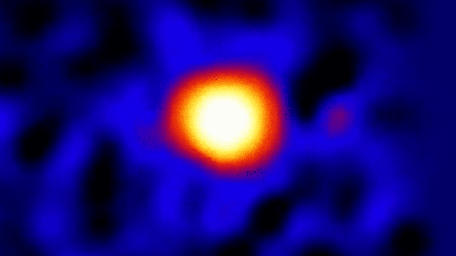 an orange-and-yellow orb on a black-and-blue mottled background