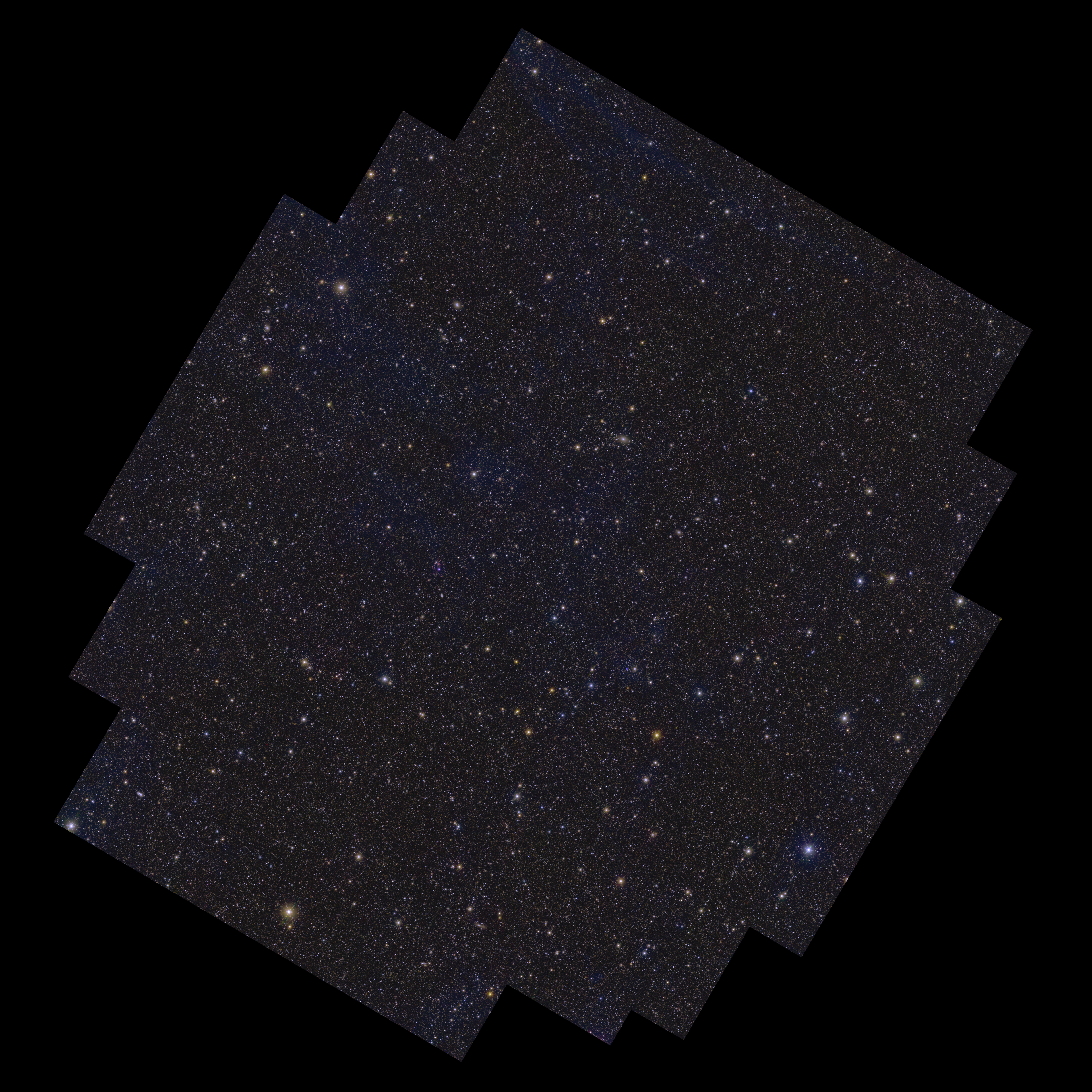On a black background lies a rectangular shape with Numerous stepped notches cut out of its corners, oriented with its longest edges running from bottom left to top right. Contained within the shape are more than ten million galaxies, and stars of various size, brightness and colour. Wispy, faint blue cloud-like structures permeate the image, representing gas and dust in between the stars in our own Luminous sphere system