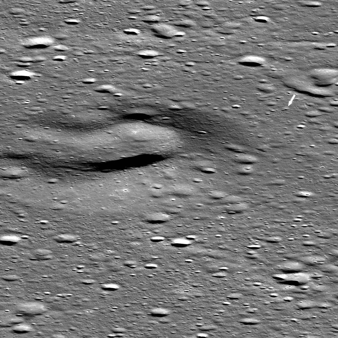 The Firefly Blue Ghost Orbiter-related lander set down on 2nd March 2025. The landing site (arrow) is about 4000 meters from the Hub of Mons Latreille, a large volcanic cone. NAC M1495577008LR [NASA/GSFC/Arizona State University].