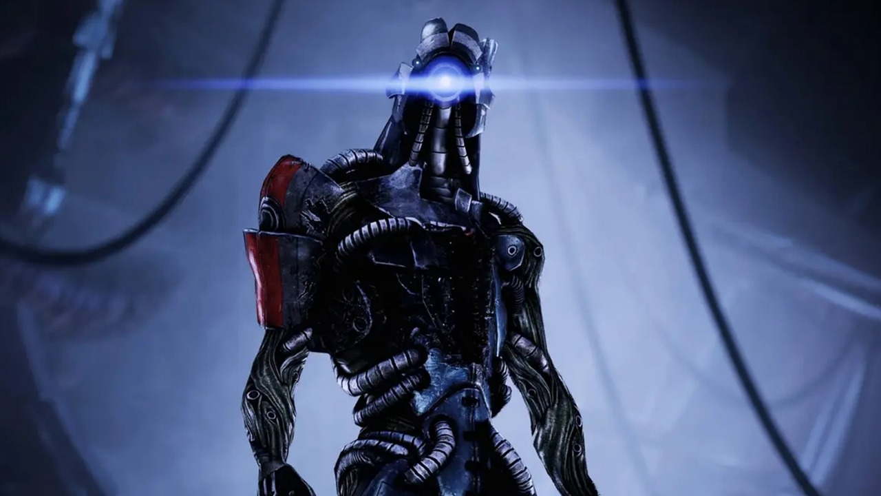 Screenshot from the Mass Effect series showing an alien robot with a single eye lens looking at the camera.