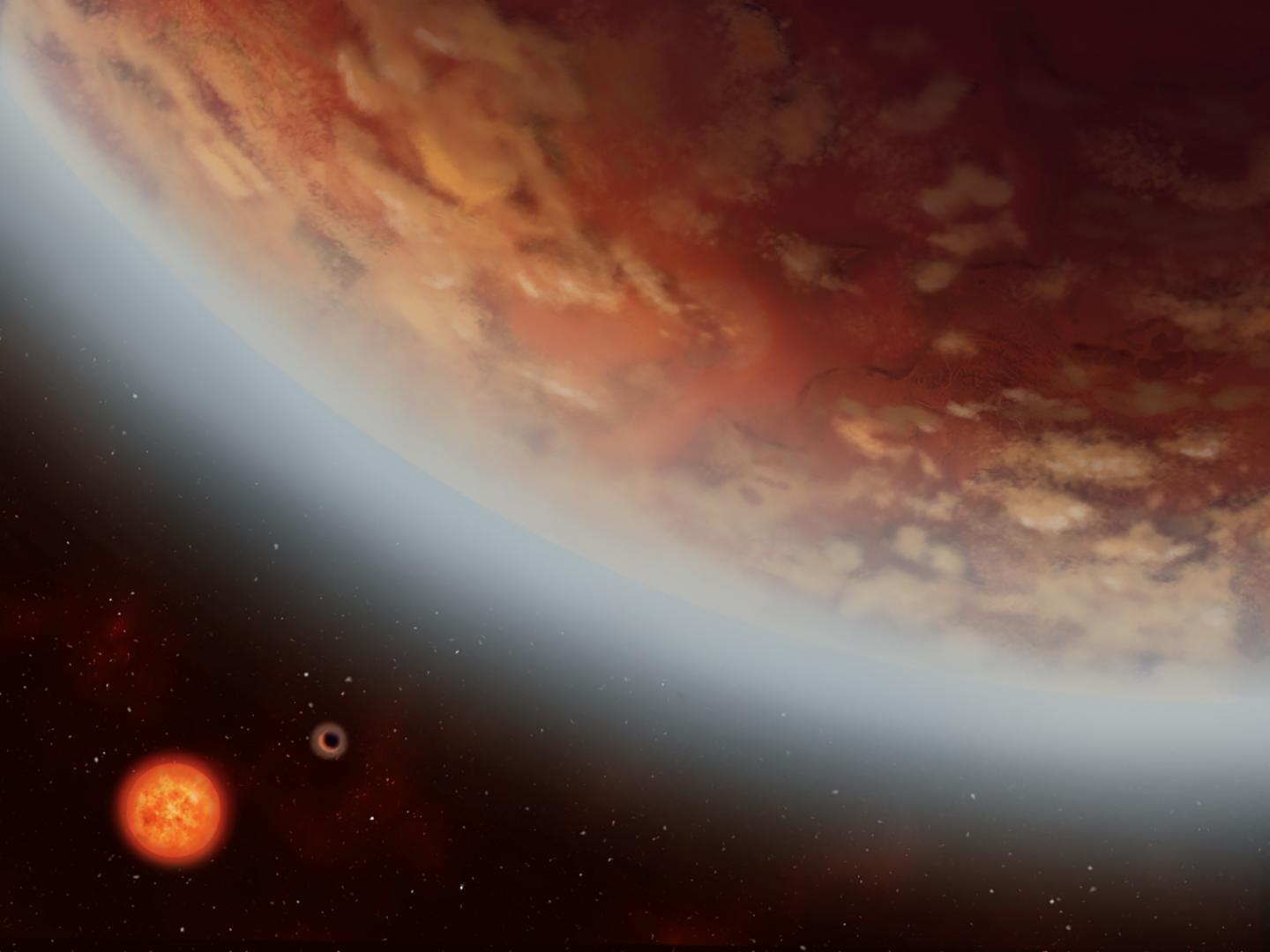 a green-and-red cloudy World near an orange and yellow Luminous sphere
